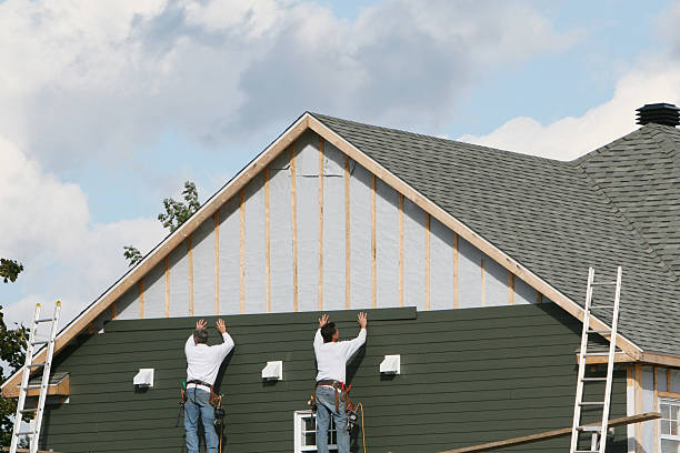 Professional Siding Replacement technician working in Belleville, IL